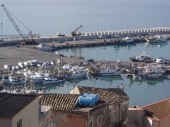 Alongside the fishing dock.