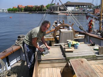 Merryn sanding the cockpit