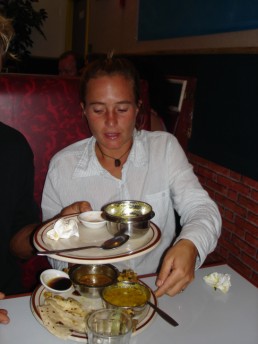Merryn tucking into curry