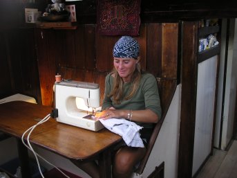 Merryn in front of a sewing machine!