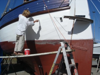 Jay busy painting the topsides