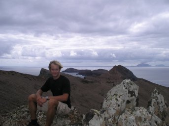 Rob walking in the rocky hills