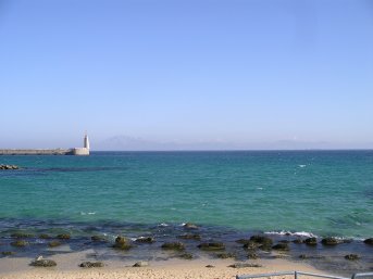 Looking past Tarifa harbour at North African coast