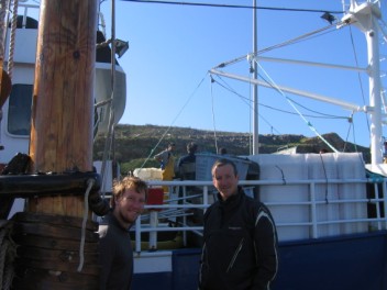 Nick and Dave by fishing boat
